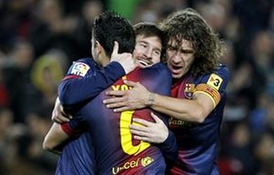 Messi-celebra-Xavi-Puyol_